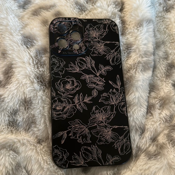 I’m selling an iPhone 12 Pro Max case with floral designs on it in black/ white - Picture 1 of 5
